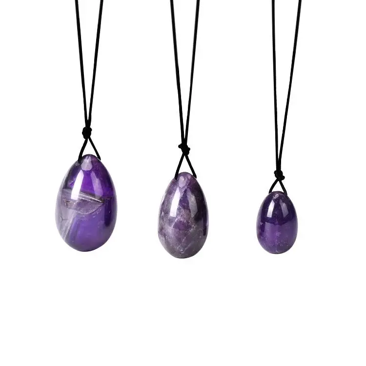 Artisans de Madagascar - Gebohrte Amethyst-Yoni-Eier - 40 x 25 mm