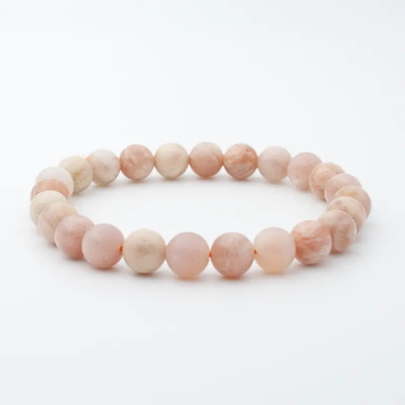 Bracelet en Pierre de Lune Pêche – Intuition, Douceur et Énergie Féminine