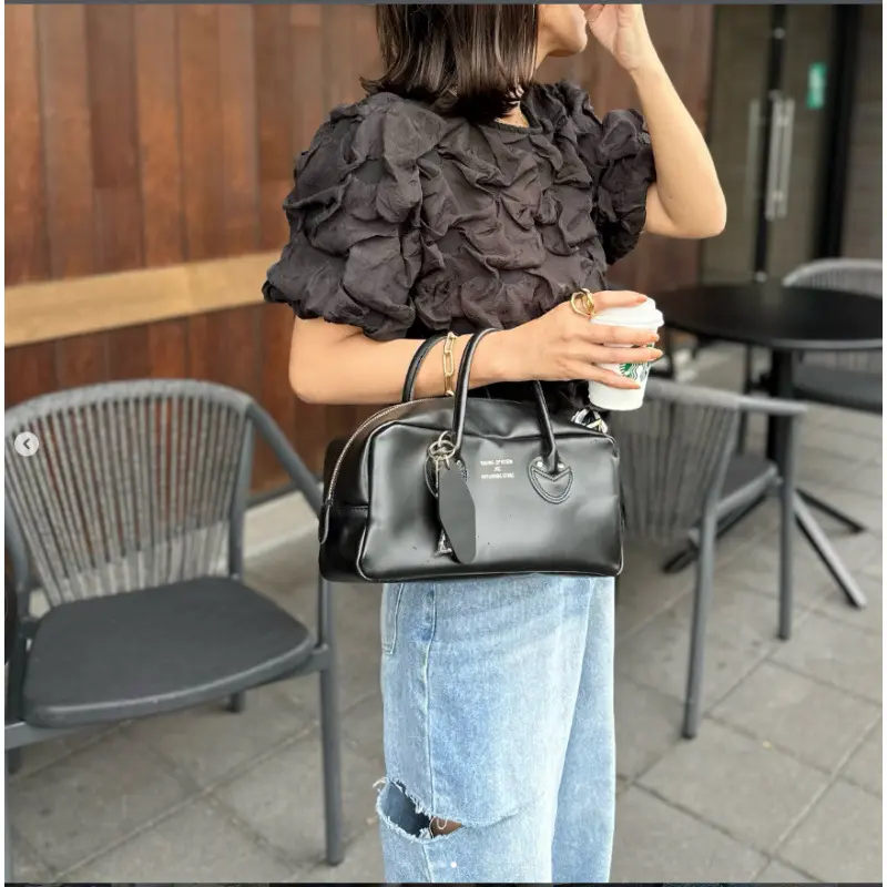 Elegante Bluse mit Puffärmeln und Raffung