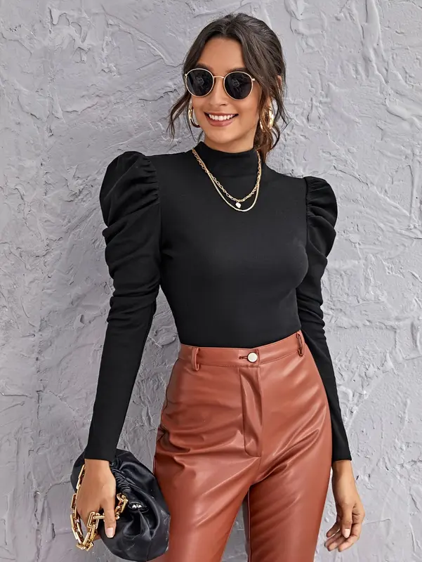 Elegantes Langarm-Top mit Tweed-Ärmeln