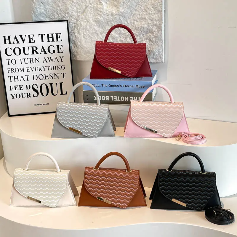 Handtasche «Onda» · Top-Handle mit Wellen-Struktur