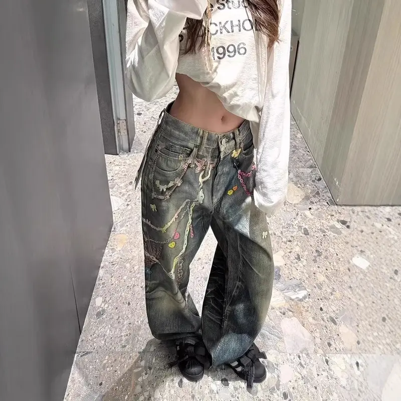 Jeans mit Print und Kettendetail, bodenlang